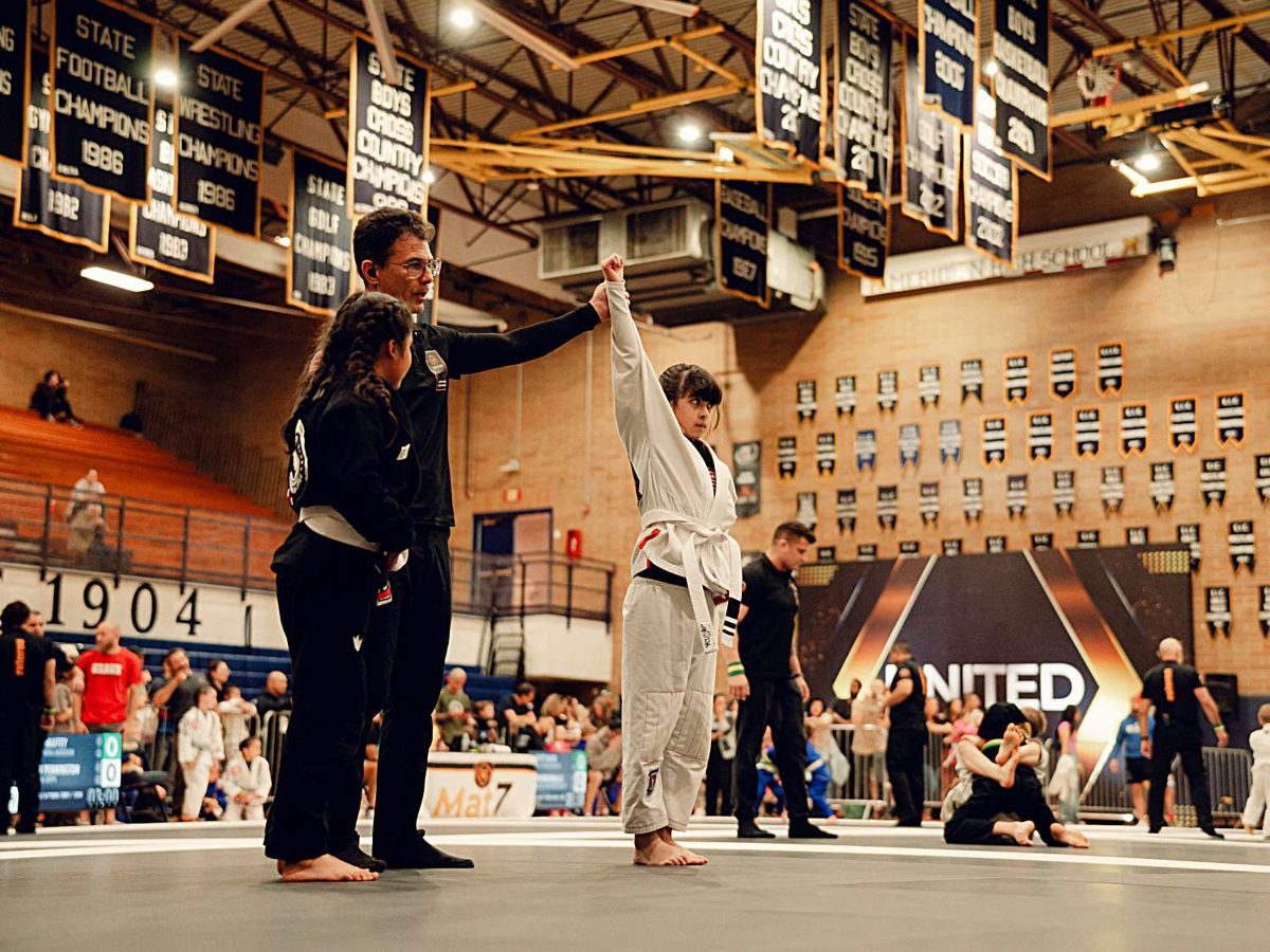 Referee raising the winner's hand at United Grappling Boise