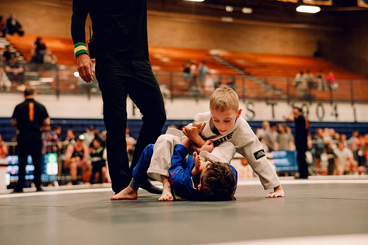 Youth athletes battling for position on the mat